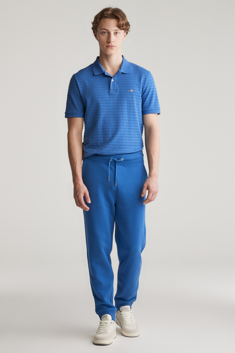 TEPLÁKY GANT REG SHIELD SWEATPANTS RICH BLUE